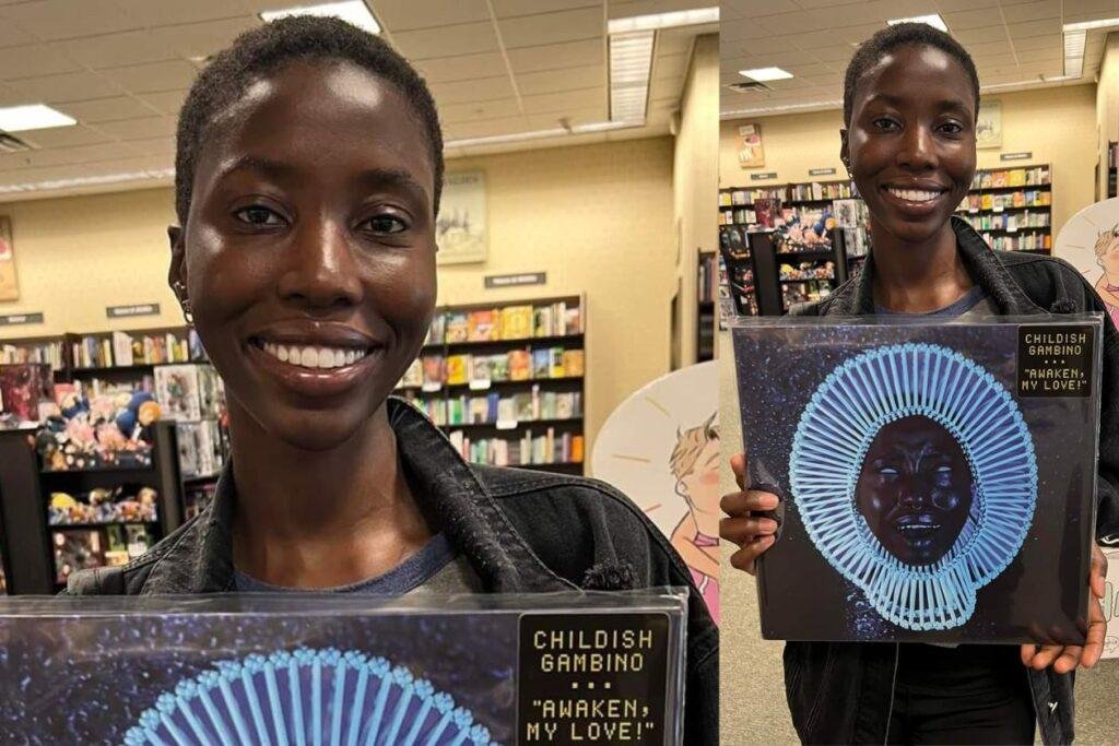 Giannina Antonette Oteto segurando disco de vinil de "Awaken, My Love" de Childish Gambino/Donald Glover.