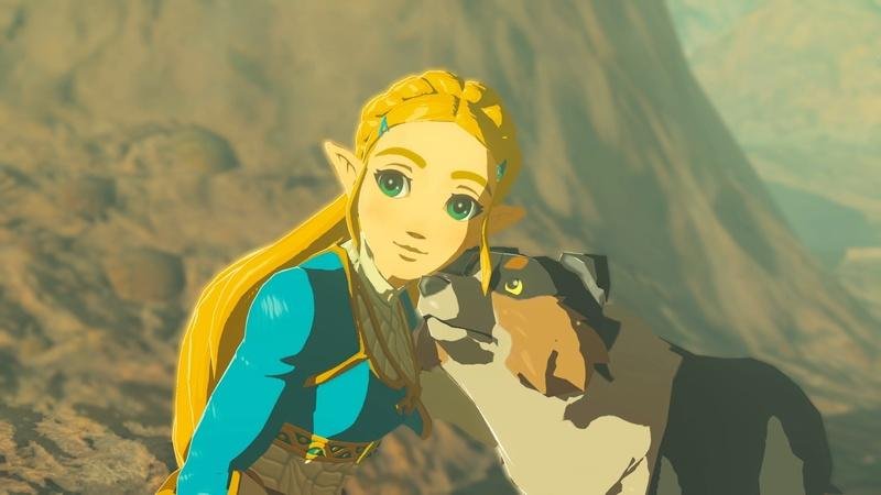Personagem heroína com roupa azul e dourada acariciando um cachorro.