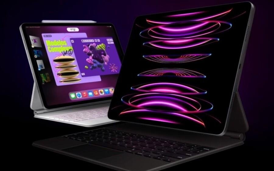 iPads com teclados iluminados mostrando gráficos coloridos e designs de modelos 3D.